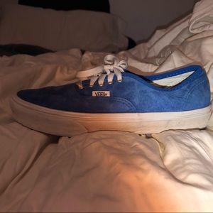 Blue vans, used but not torn up.